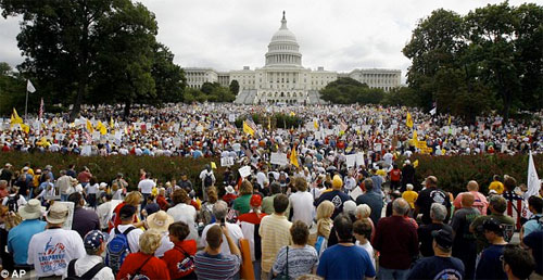 Tens of thousands of people converged on Capitol Hill on Saturday to protest against government spending