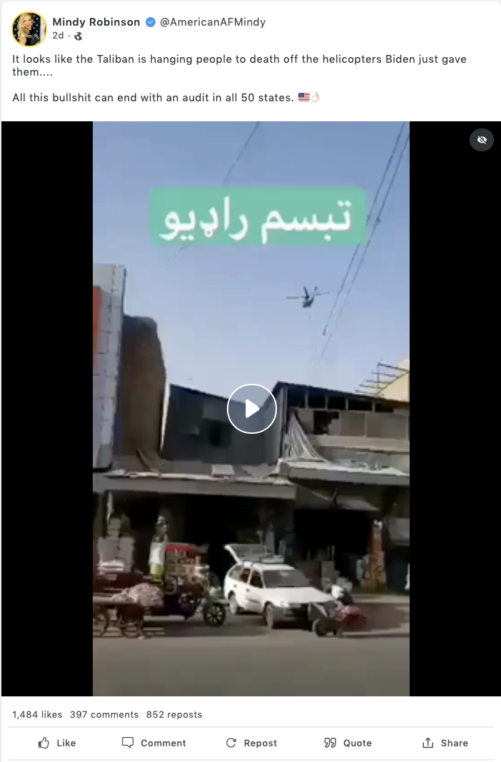 A screenshot from the right-wing website Gab showing a post by user Mindy Robinson with the viral helicopter video and a comment that reads "It looks like the Taliban is hanging people to death off the helicopters Biden just gave them....  All this bullshit can end with an audit in all 50 states"