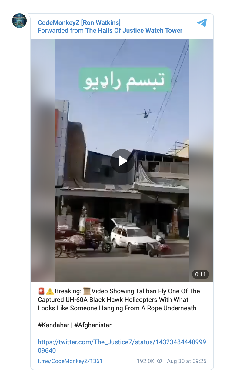 A post from the messaging site Telegram with an image from the helicopter video. The text below reads "Breaking: Video Showing Taliban Fly One Of The Captured UH-60A Black Hawk Helicopters With What Looks Like Someone Hanging From A Rope Underneath"