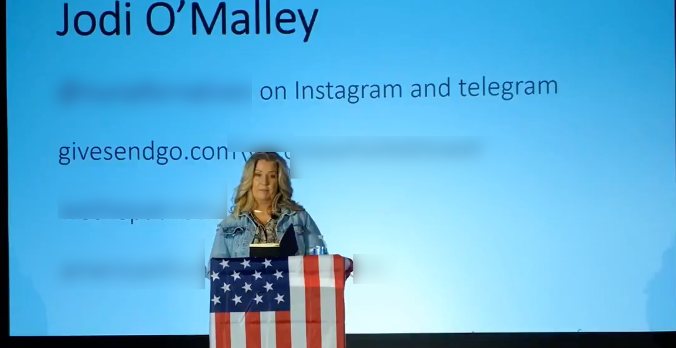 O'Malley QAnon conference background