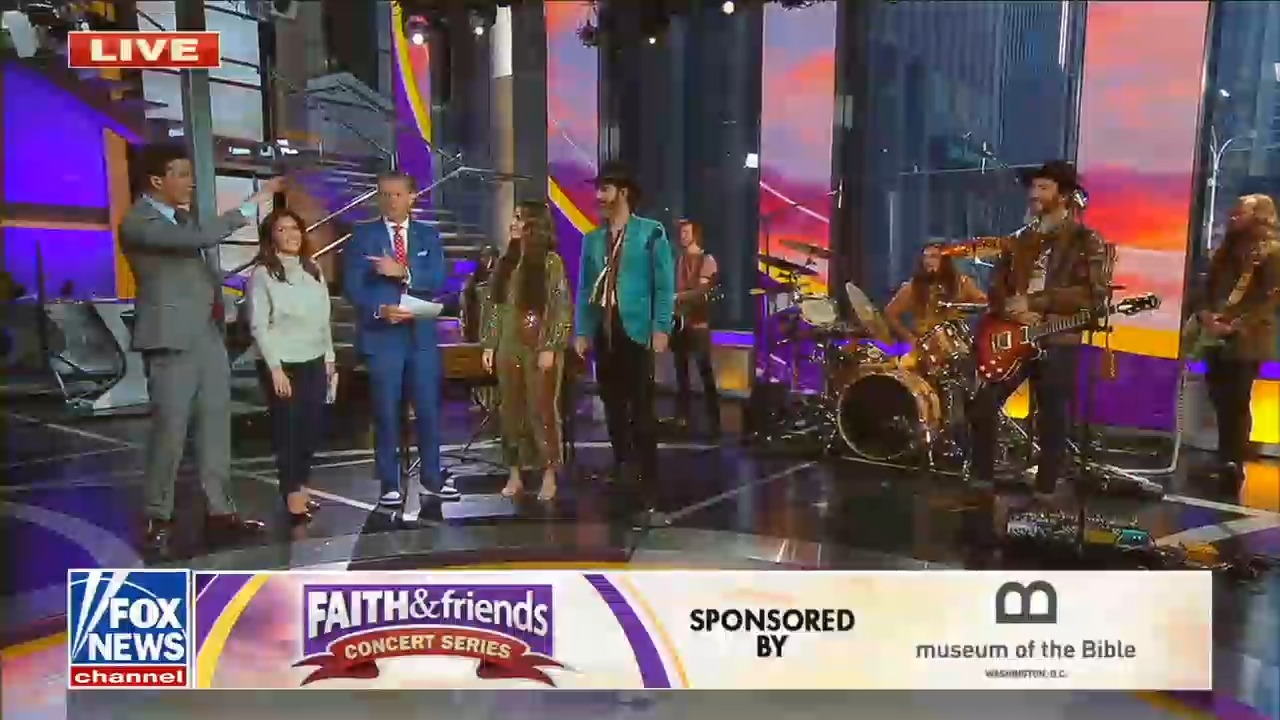 The band, We the Kingdom, is standing on the Fox and Friends set and the chyron reads Faith and friends concert series sponsored by Museum of the Bible