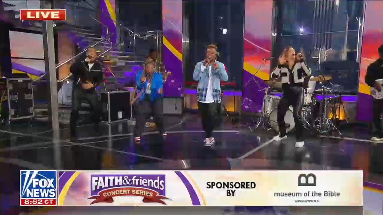 Fox and Friends stage is full of a praise and worship band dressed in casual clothes. The chyron reads Faith and Friends concert series sponsored by Museum of the Bible