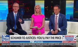 Steve Doocy, Ainsley Earhardt, and Brian Kilmeade above a chyron reading "Schumer to Justices: You'll Pay The Price"