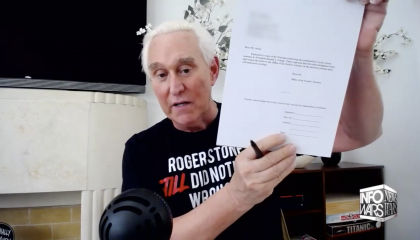 Roger Stone signs paperwork hd