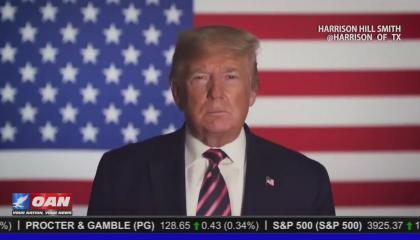 A screenshot of an OAN "tribute" to Donald Trump, with the 45th President standing against a U.S. flag background. Top right displays a credit for an Infowars contributor, Harrison Hill Smith