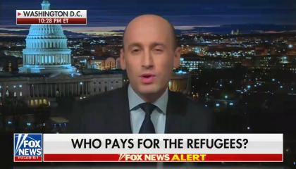 chyron reads, "WHO PAYS FOR THE REFUGEES?"
