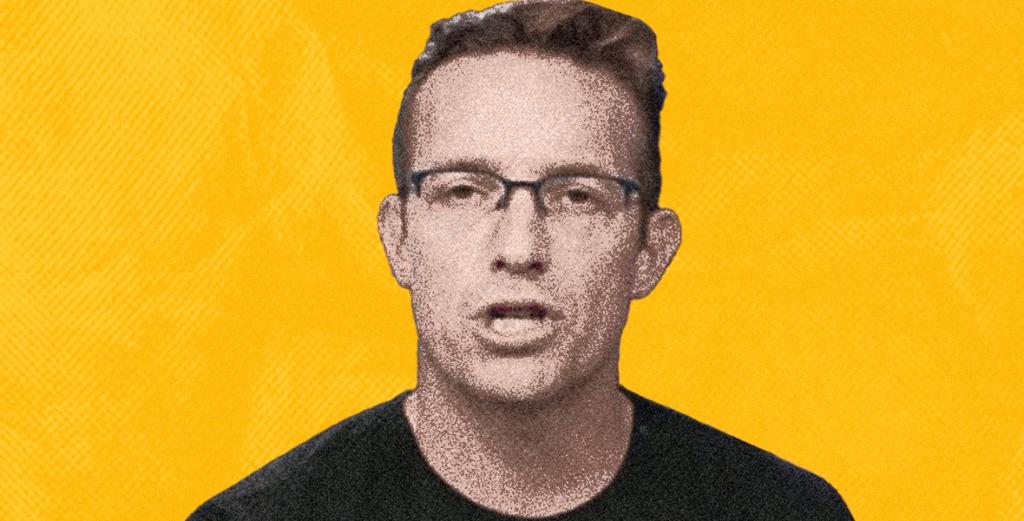 Benny Johnson in front of a yellow background