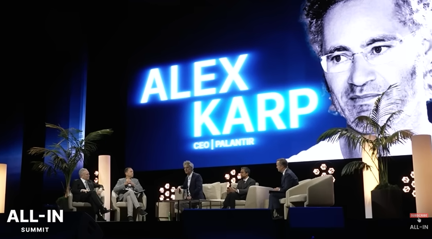 Alex Karp on the All-In Summit stage